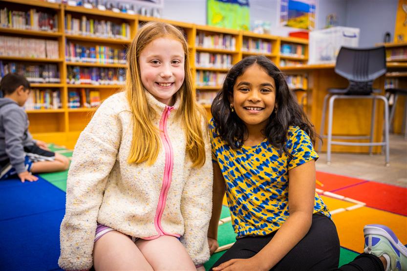 Students use Bee-Bots in the Learning Commons